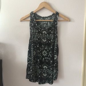 black muscle tee with flower designs